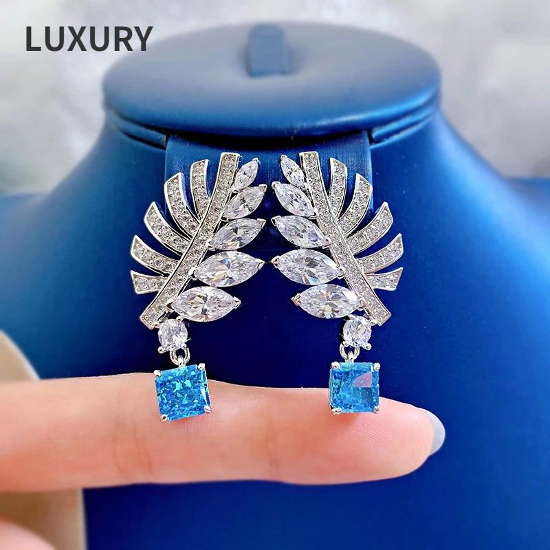 

Luxury 925 Sterling Silver High Carbon Diamond Hand Inlaid 7*7 Aquamarine Princess Feather Earrings
