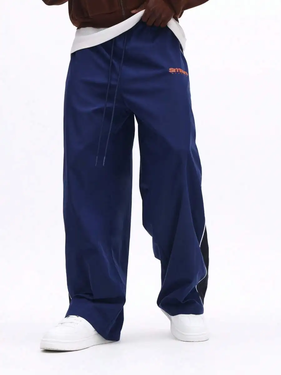Casual Wide Leg Nylon Track Pants With Side Contrast Stripe For Streetwear And Athleisure