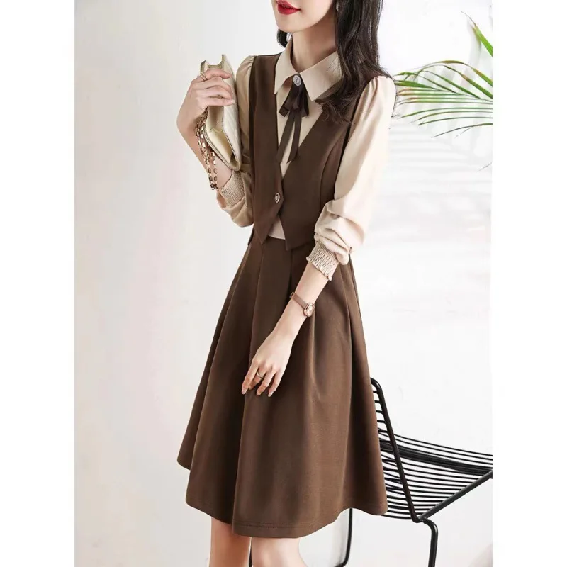 

Fake two-piece splicing skirt autumn new Korean version fashion bow bow tie decorative dress