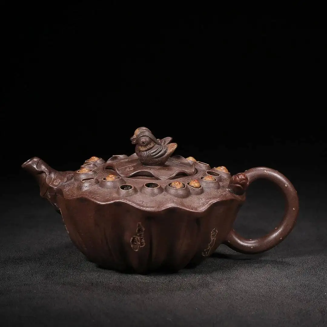 

Chinese Yixing Zisha Clay Handmade Exquisite Teapot - "Pelecan Playing In The Water" Design. Designer: Chen Mingyuan 300CC