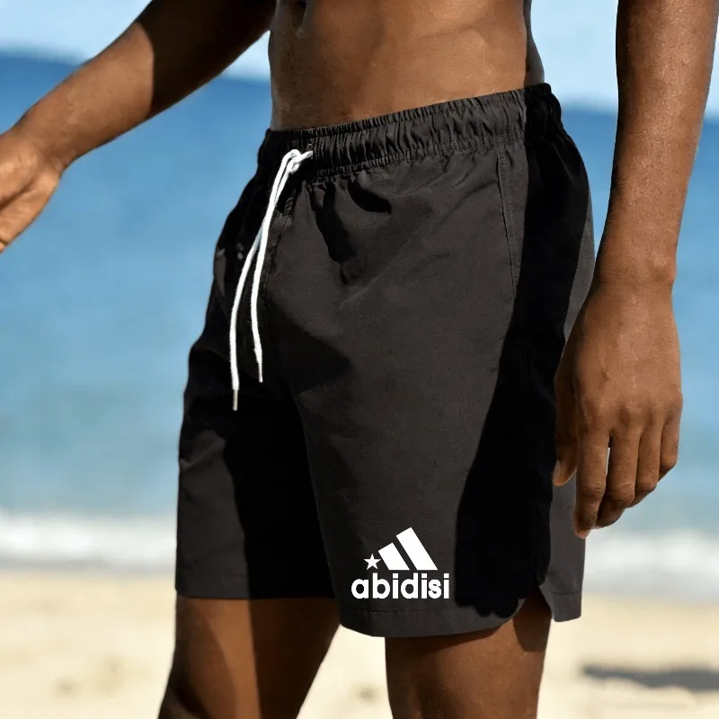 Men's summer beach vacation swimming shorts are fashionable, breathable, quick drying, and suitable for beach play