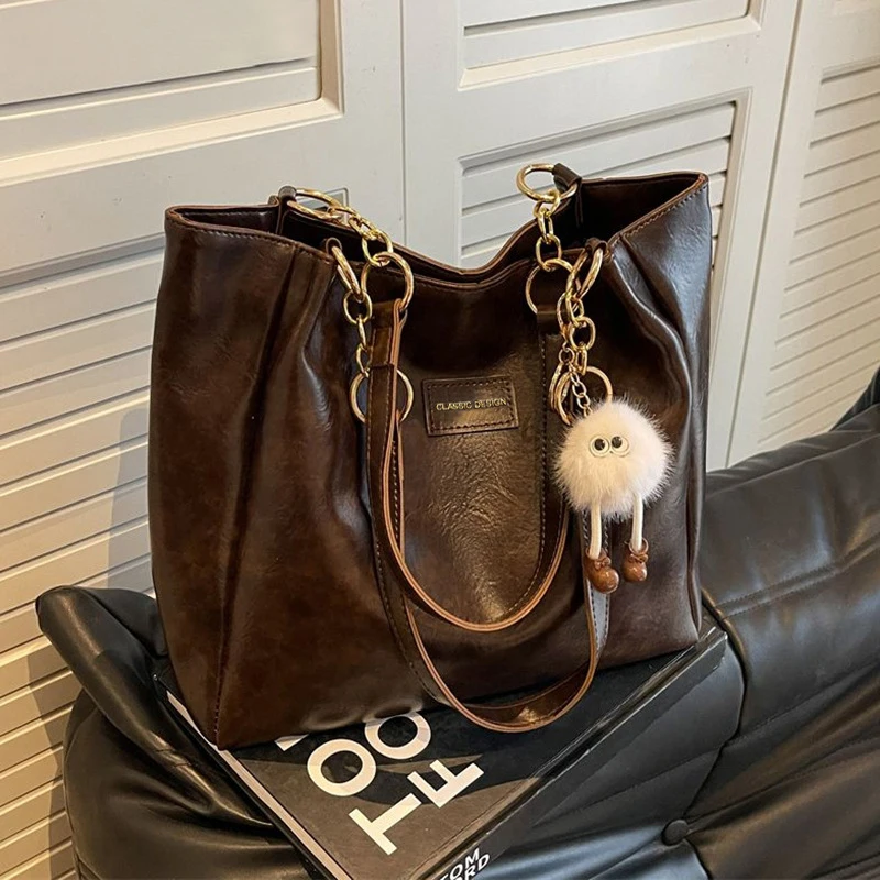 

Tote Bag Women2026New genuine leather women's bag, large capacity crossbody shoulder handbag, commuter bucket bag