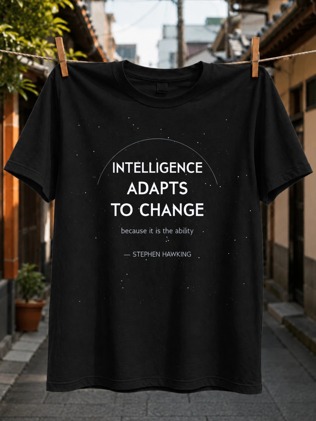 Intelligence A D Apts To Change Stephen Hawking quote with subtle starfield and clean minimalist  Unisex All T-Shirt