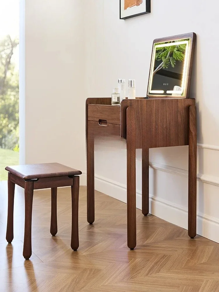 A *Japanese-style solid wood integrated simple small apartment black walnut clamshell dressing table