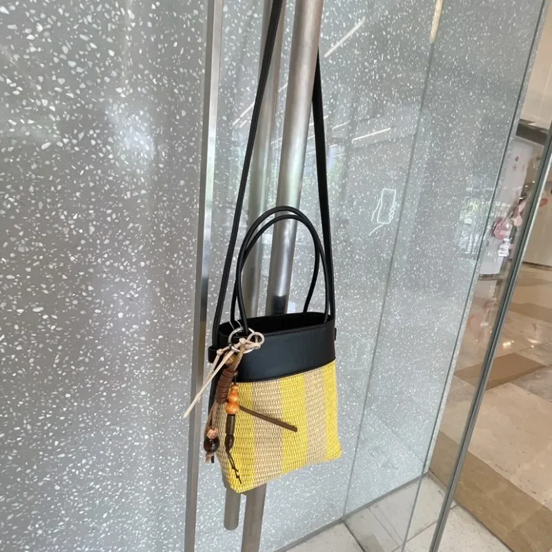 new contrasting cowhide woven bag women's Lafite straw woven messenger bag versatile striped mobile