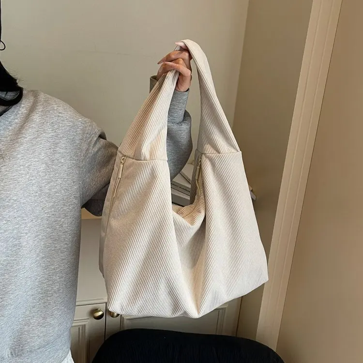

New High-end Tote Bag Women's Large-capacity Shoulder Messenger Bag Niche Hand-held Armpit