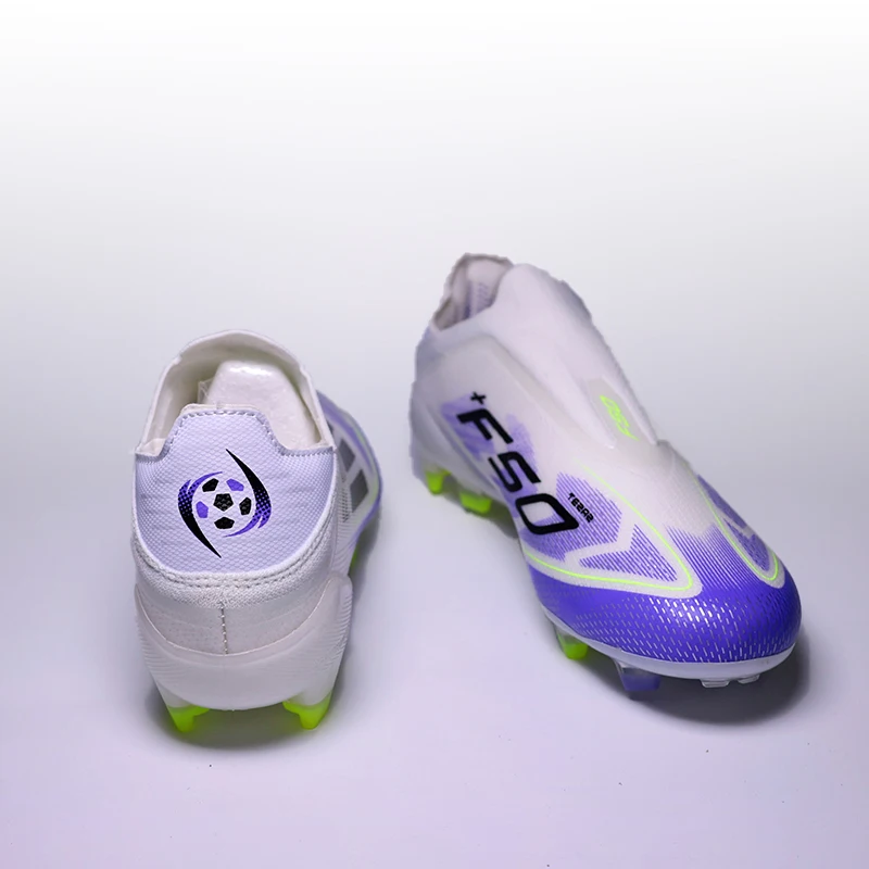 Scarpe da calcio antiscivolo senza pizzo Scarpe da calcio da uomo professionali per giovani FG/TF F50+ Scarpe da calcio veloci con borchie da allenamento per uomo