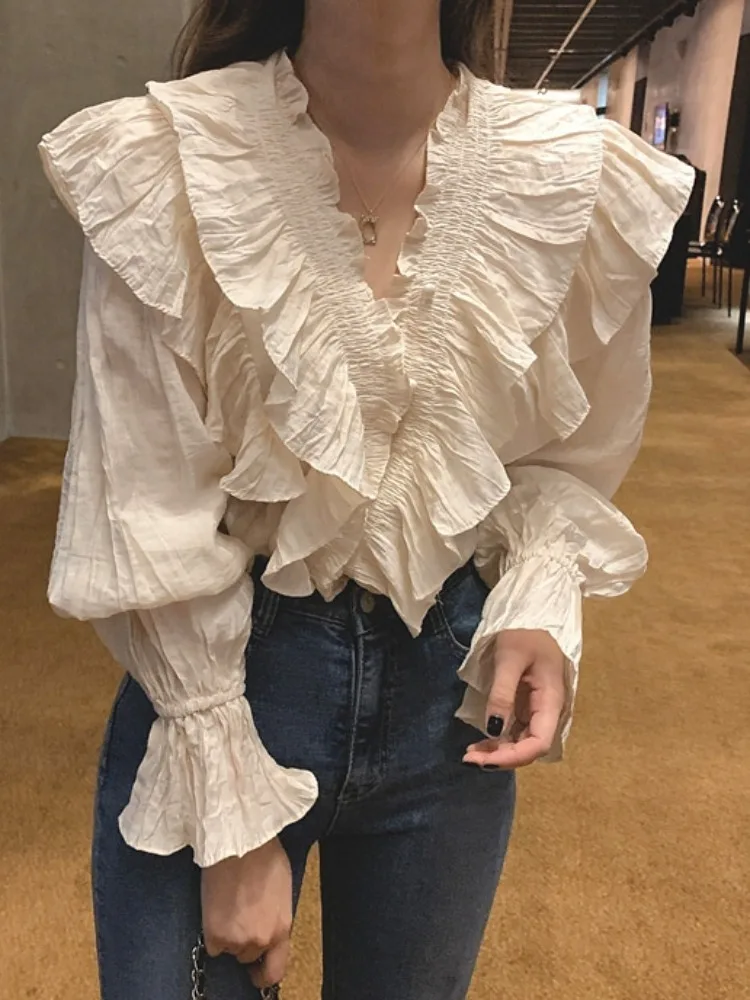 Chique vroege herfst afslankende V-hals knoopdetail geplooide Bell Sve irt top dames Faion lente herfst pure kleur lang S...