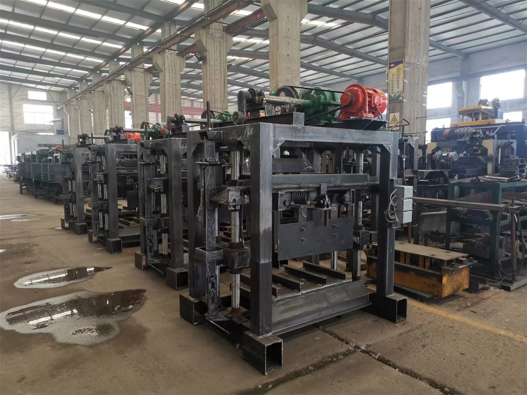 QT4-40 Manual Clay Block Maker Produces Red Bricks Cheaply and Efficiently from Factory Cinder Material