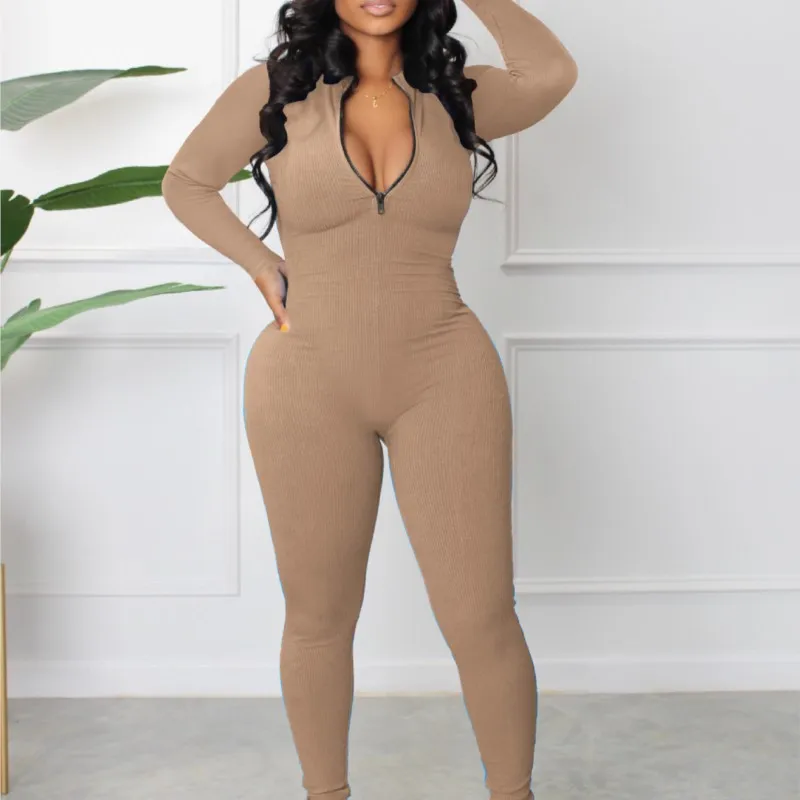 بدلة قفز مضلعة بلون سادة للنساء بأكمام طويلة بتصميم سحاب نحيف غير رسمي نمط رياضي مجموعة خريف جديدة Macacão Feminino