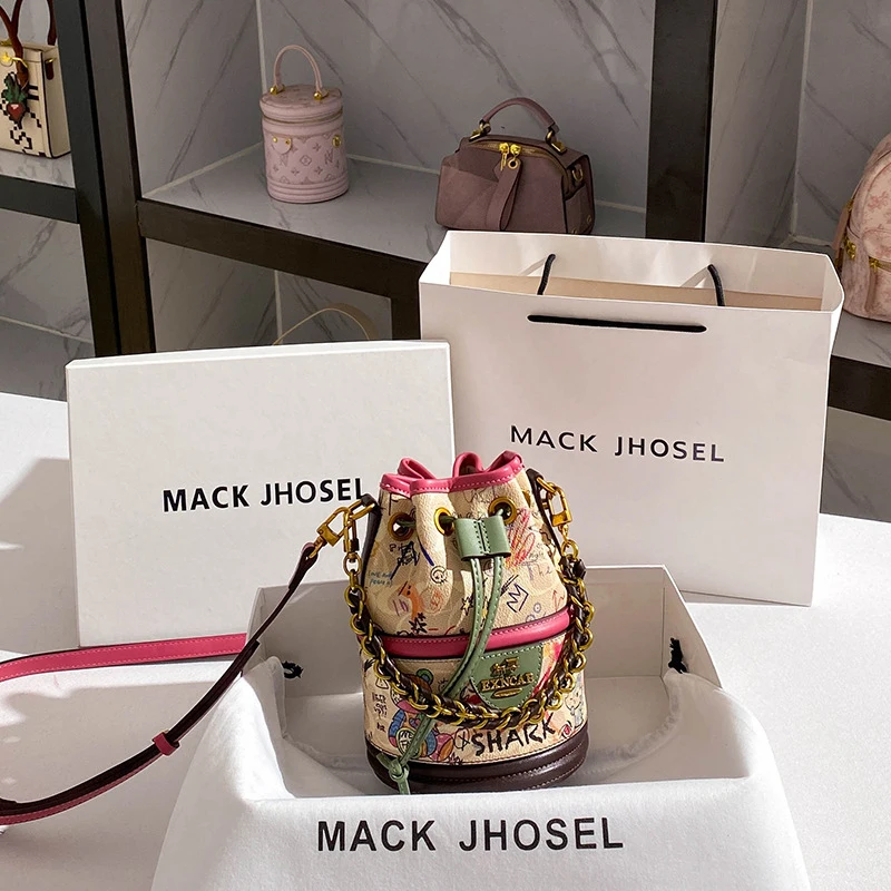 

Drawstring graffiti bucket bag, high-end niche cylindrical handbag