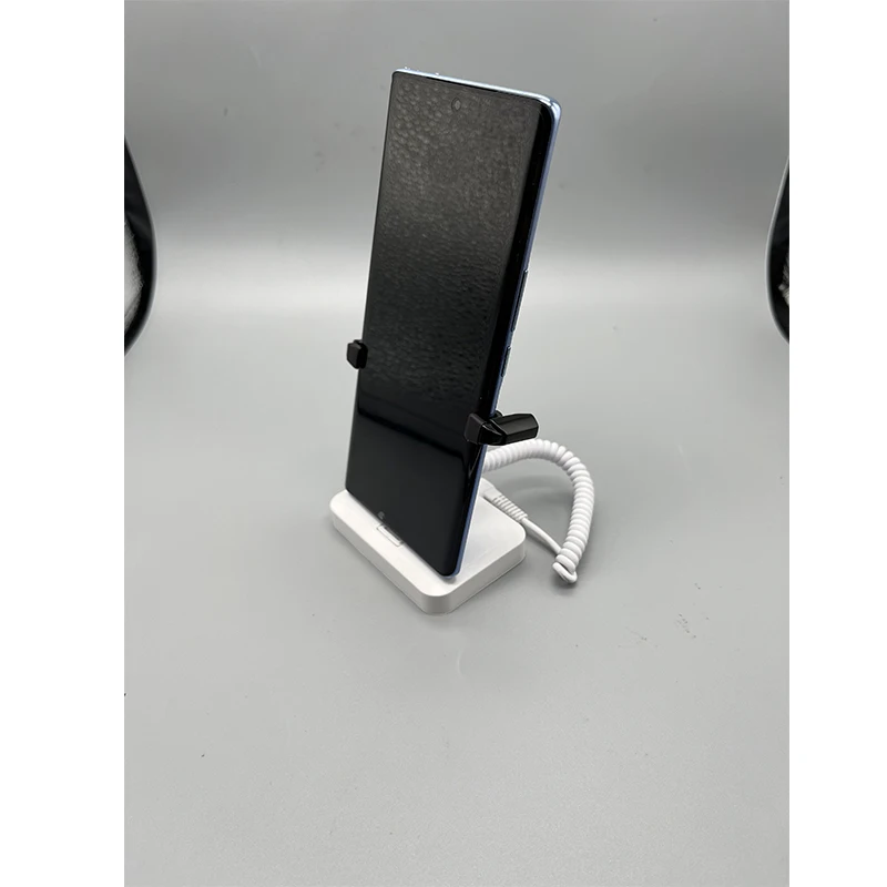 

Secure A/nti-Theft ABS Mobile Phone Stand with Alarm System Charging Stand for All Phones