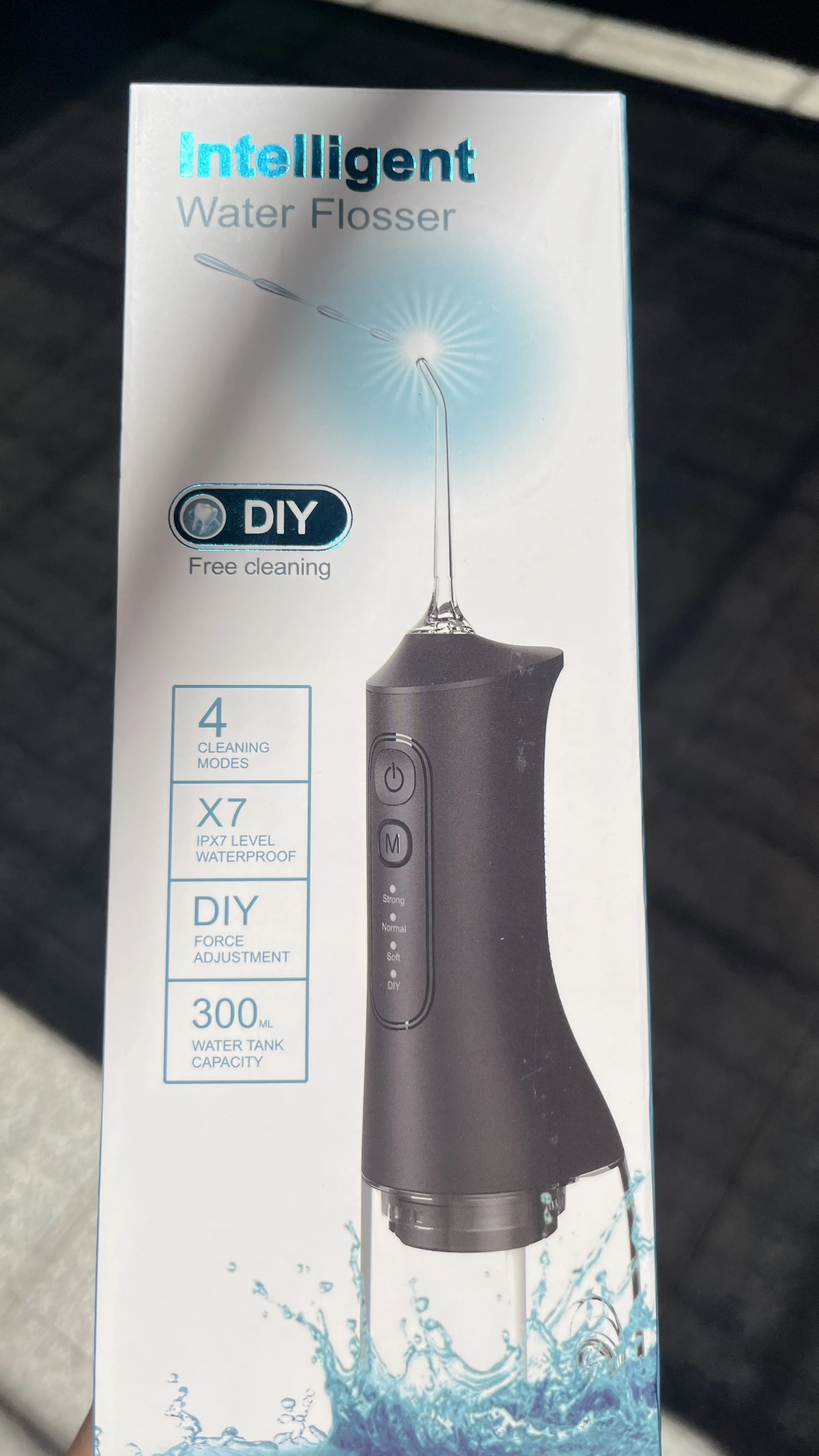 2025 مصدر الشركة المصنعة جهاز ري الأسنان المحمول المنزلي لتنظيف الفم وإزالة حساب التفاضل والتكامل الأسنان الكهربائي #1