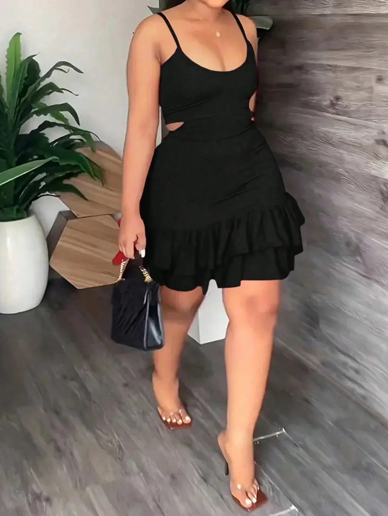

Black Cutout Cami Mini Dress With Ruffled Hem And Spaghetti Straps