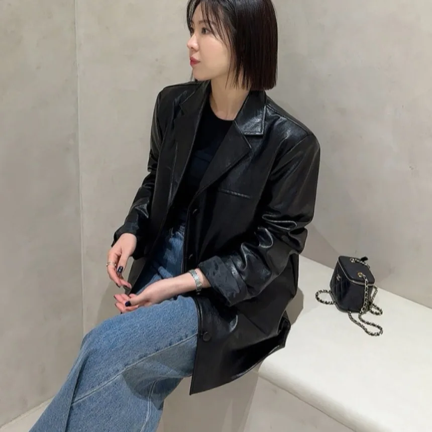 معطف نسائي أنيق فضفاض بتصميم عتيق من جلد البولي يوريثان Jaet Faionable Commute متعدد الاستخدامات طويل Sve irt النسخة الكورية من الجلد