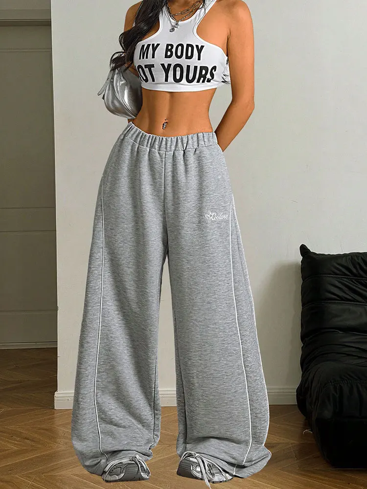 

Женские спортивные штаны, осенняя новая уличная одежда, модные яркие линии, украшения с принтом, универсальные брюки с эластичной резинкой на талии, повседневные узкие брюки