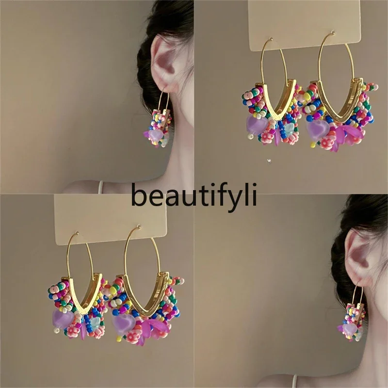 

See the rainbow! V-shaped flower earrings! Exaggerated design ear buckles Women's simple fashion earrings