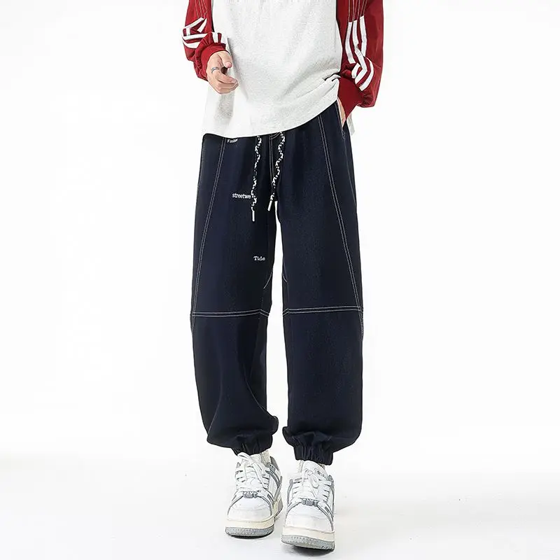 Pantaloni da uomo stile retrò taglie forti versatili per la primavera e l'autunno pantaloni allacciati alla caviglia pantaloni da lavoro casual larghi e dimagranti