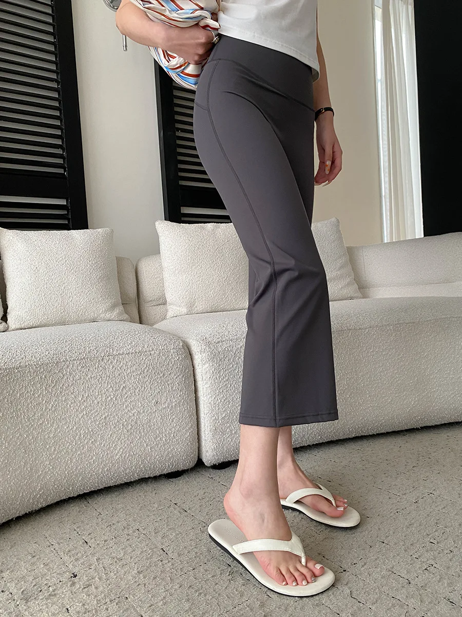 Sommerliche Damen-Yogahose in Uni-Farbe mit hoher Taille, Po-Lifting-Effekt, schmaler Passform, Bambusfaser-Beinen und leicht ausgestelltem Schnitt – Detail 11