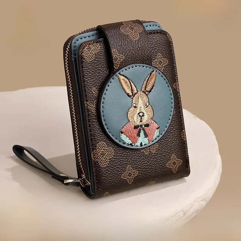 ファッショナブルな縦型ショートウォレット女性用コンパクト小銭入れ磁気バックル開閉式pvc素材漫画柄プリント