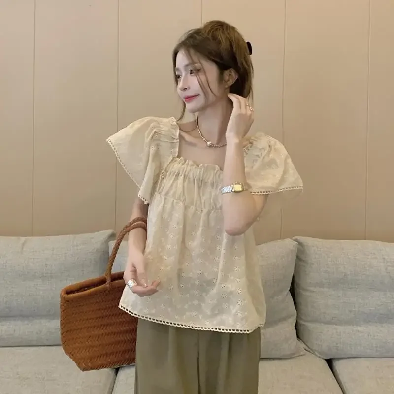 เสื้อเด็กคอเหลี่ยมดีไซน์เฉพาะตัวของผู้หญิงและเสื้อเชิ้ตคลุมท้องระดับไฮเอนด์ที่สวยงาม