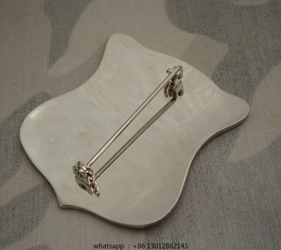 

Metal badge, silver solid copper