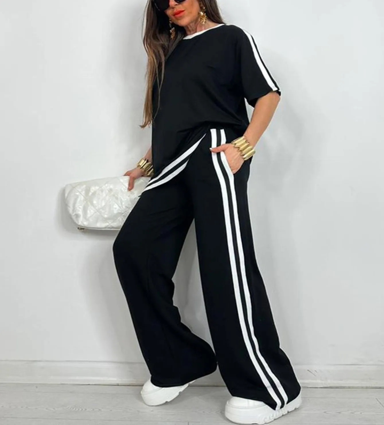 

Женский модный однотонный спортивный костюм больших размеров с круглым вырезом и короткими рукавами с длинными брюками;