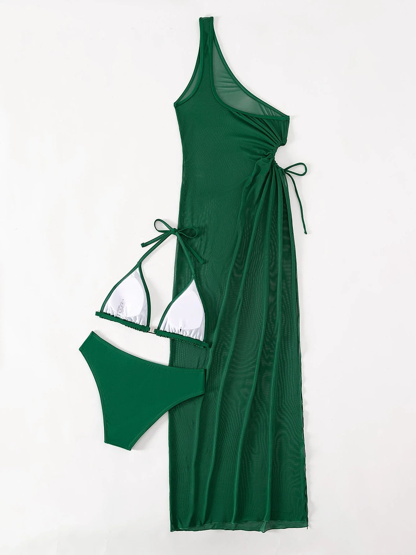 

Зеленый комплект из трех предметов: купальник, прозрачное платье-накидка и треугольное бикини