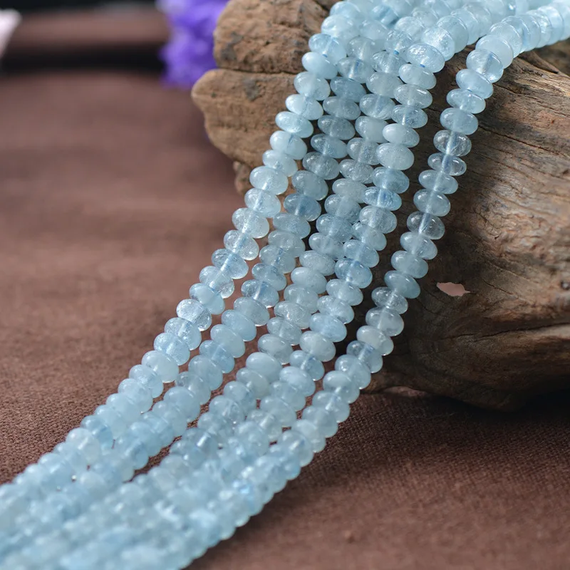 

Joanlyn Grade AA Natural Aquamarine Abacus Beads NOT Dyed 3x5mm Flat Round 15 Inch Strand AQ32