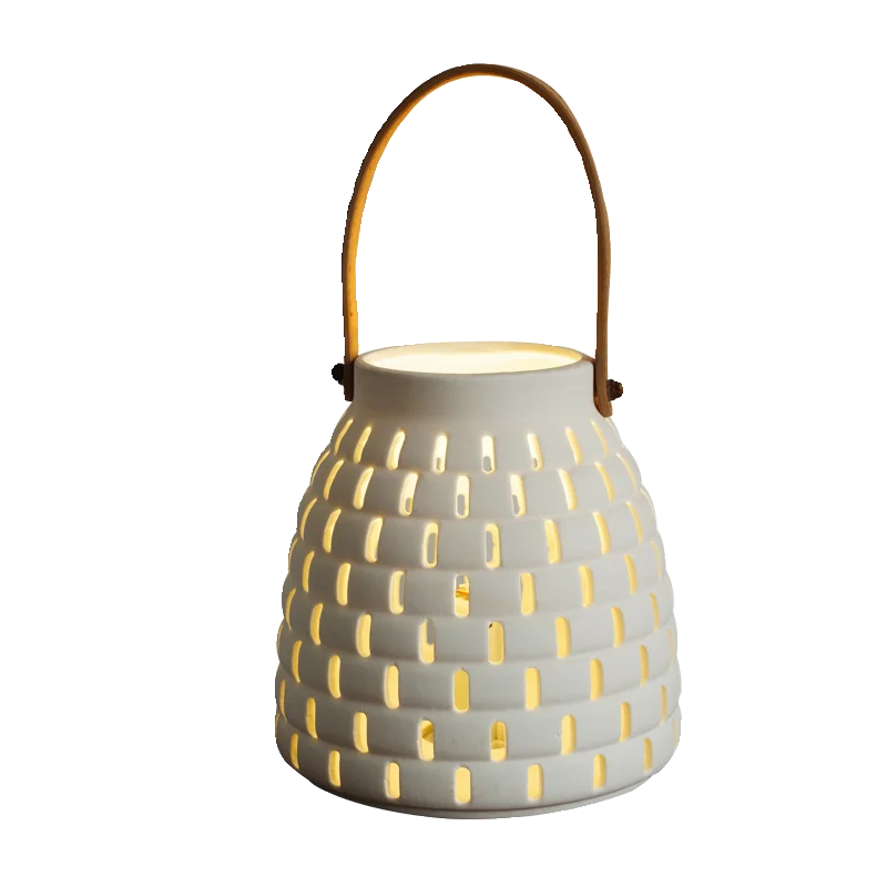 Nordic romance, export European minimalist designer ceramic hollow portable lighting decoration, home party wind lamp