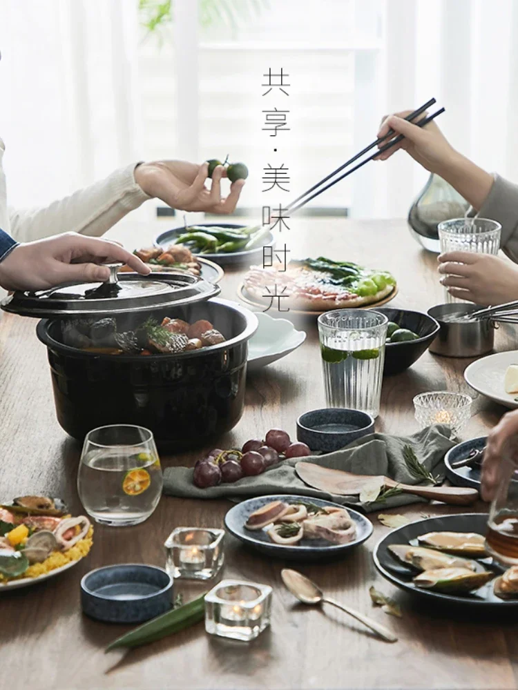 Joyoung / JiuYang F-40T11 الأرز طباخ المينا الحديد غلاية المنزل الذكي الحجز IH التعريفي التدفئة 4L