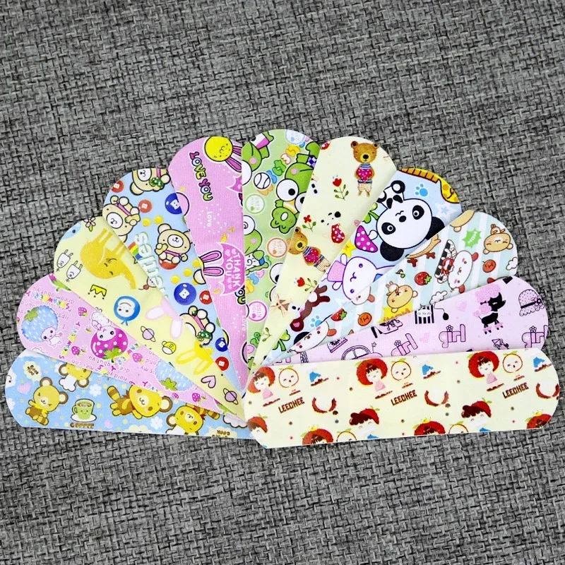 100 Pcs Random Pattern Waterproof Cartoon Band Aid Wound Dressing Patches Baby Kids Adhesive Bandages First Aid Emergency Kit