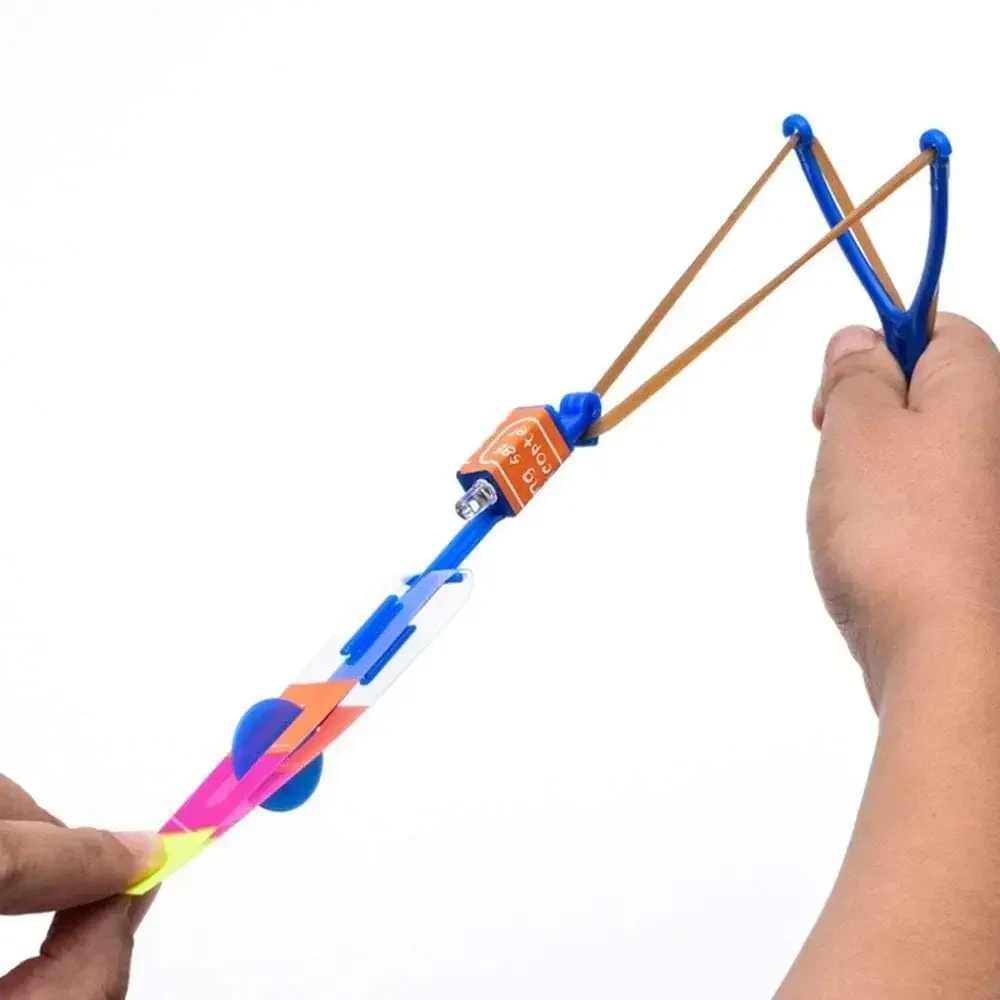 5/10/20pcs Led Light Arrow Helicopter Slingshot Ejection Flying Toy  Kids Adult Mini Flying Toy Flash Rubber Band Catapult Toys view 5