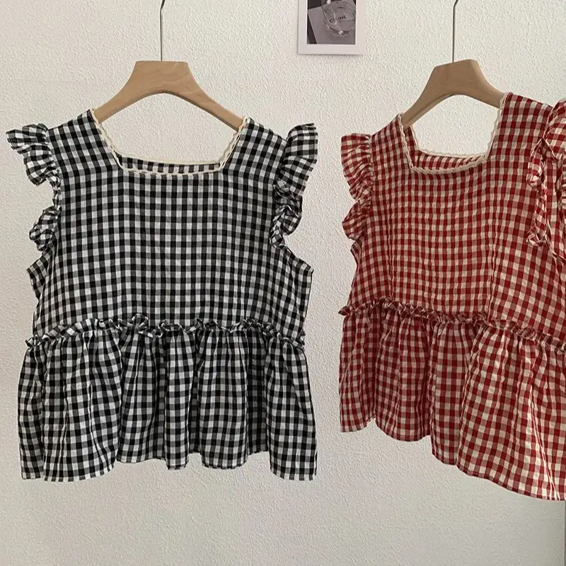 2025 ฤดูร้อนใหม่เผ็ดสาวอารมณ์อเนกประสงค์หลวมสบายๆลาดไหล่หนึ่งไหล่ลายเสื้อยืดผู้หญิงด้านบน