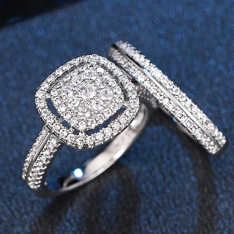 Huitan Classic 2 Stück Set Eheringe für Frauen Silber Farbe Luxus brillanten Zirkonia Temperament eleganten weiblichen Schmuck
