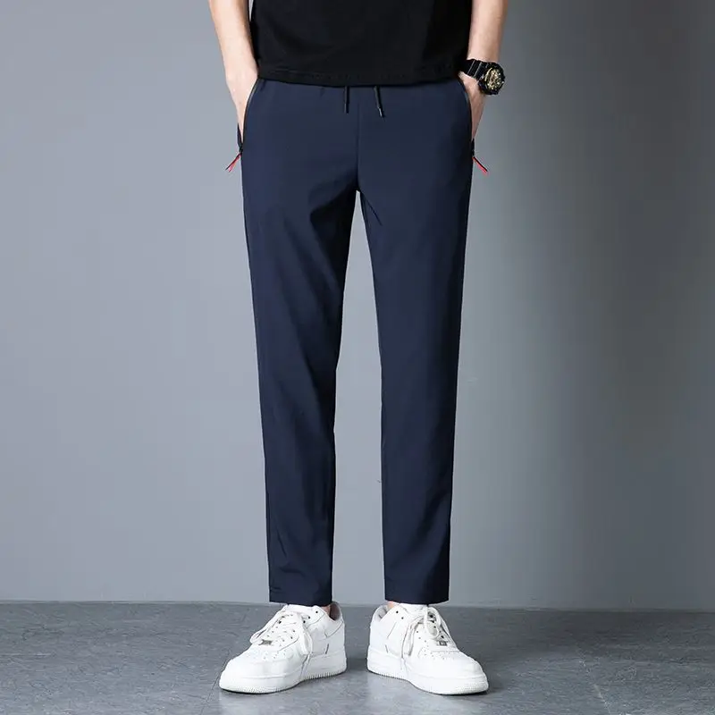 Men's casual pants straight leg slim fit elastic waist jogging pants Korean classic blue black gray men's pants plus size 4XL5XL