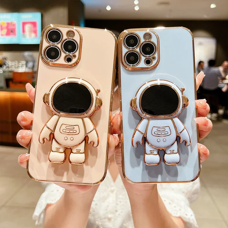 Custodia per telefono con staffa per astronauta galvanica per IPhone 16 15 Pro Max 14 13 12 11 SE2/SE3 Xs Xr custodia protettiva in Silicone per lenti