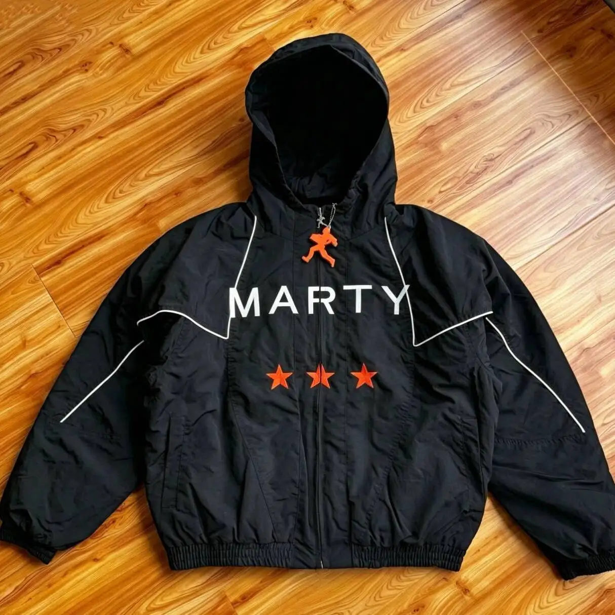 Nahmias Marty SS26 Cotton Jacket with Chest Logo Lettering And Star Pattern Unisex Long Sleeve Hooded Coat for Men And Women