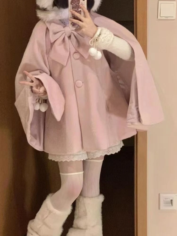 Otoño cálido coreano Popular mujer capa abrigo japonés Lolita dulce arco adelgazante chica mágica diseñador Chic Ponchos ropa de mujer