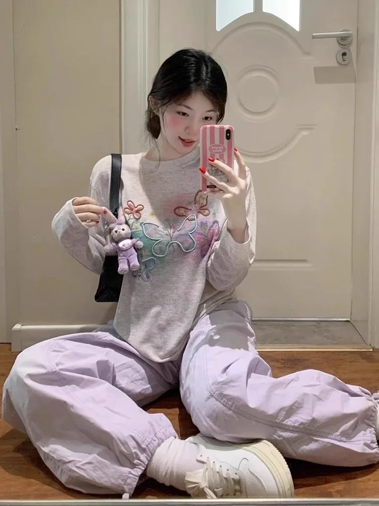 تي شيرت نسائي كوري بأكمام طويلة للخريف وزر مزدوج وحاشية منحنية وملمس جامعي ذكي وأدبي متواضع شبابي وأنيق #1