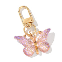 Exquisite purple dropper resin butterfly keychain crystal butterfly lobster button pendant couple gift handbag pendant keychain