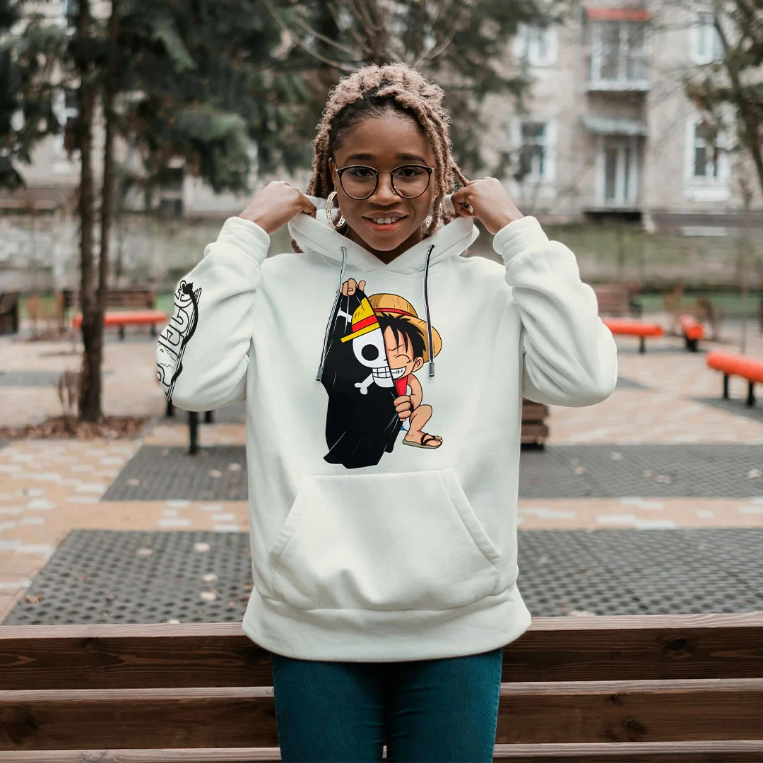 

One Piece Inspired White Hoodie with Luffy Smiling Face Print and Skull Pattern Sleeve Designs for Adults and Kids Daily Casual