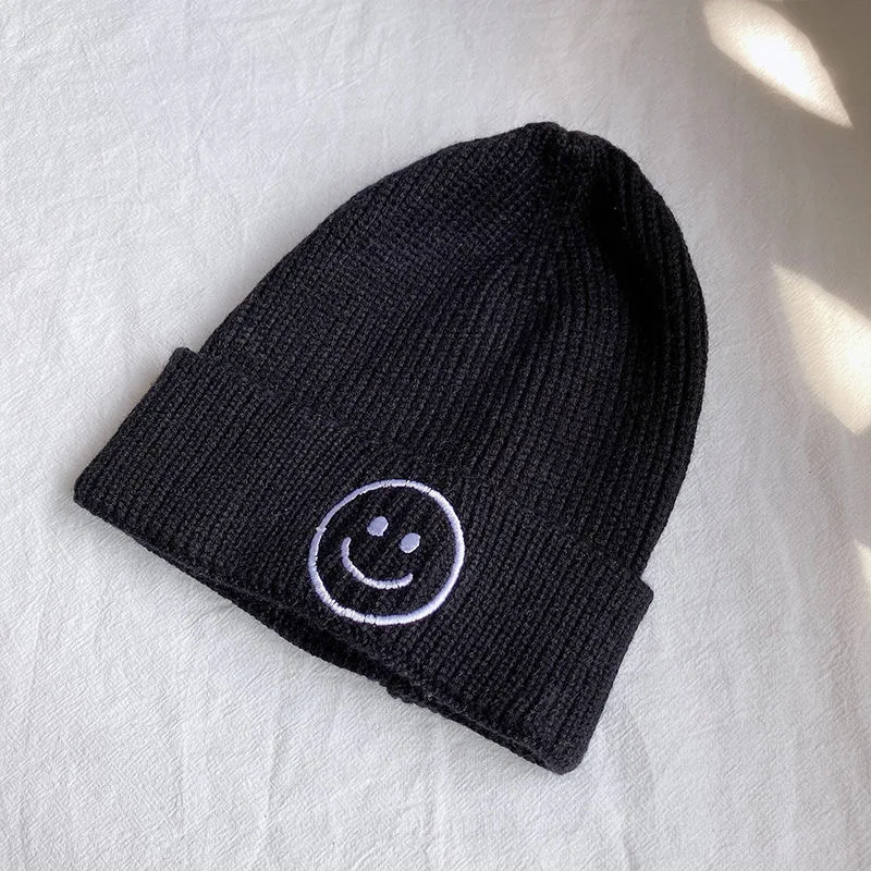 Children\'s smiley face hat Baby hat Fall Winter children boys and girls cute warm knit hat woolen hat trend