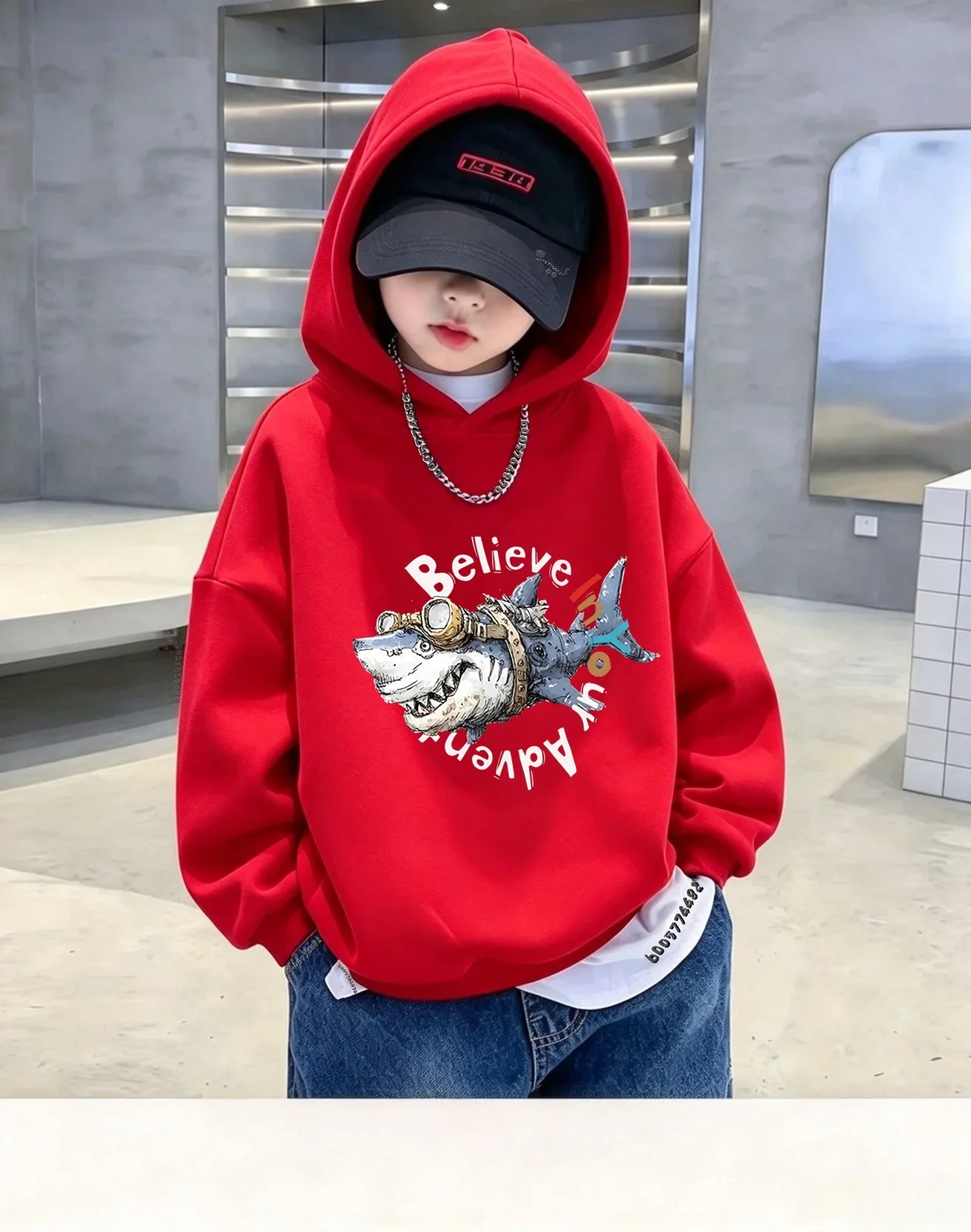 Trendy hooded sweatshirt for boys and girls (Autumn/Winter), featuring a stylish shark graphic and lettering on the front.