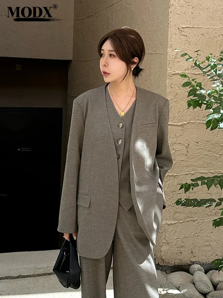 

[MODX] Minimalist collarless wool suit women's style 2024 autumn and winter new style temperament suit jacket high-end sense