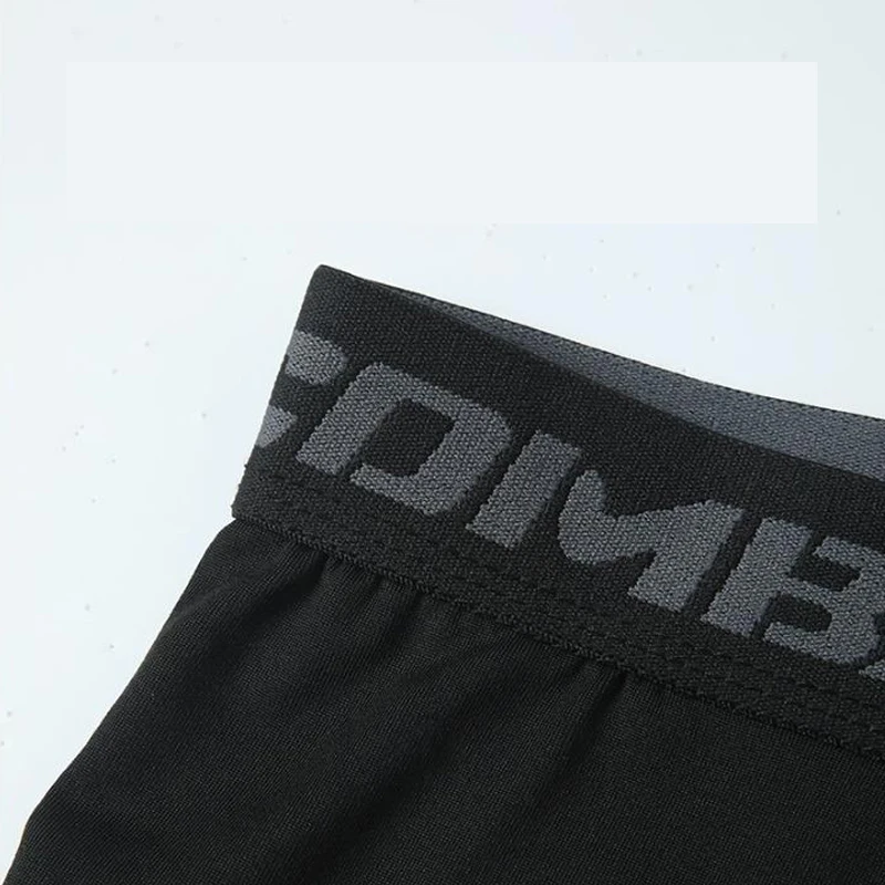 سراويل رياضية شهيرة لعام 2025 بثلاثة أرباع للرجال، سراويل قصيرة عالية المرونة وجيدة التهوية وسريعة الجفاف للياقة البدنية وكرة السلة