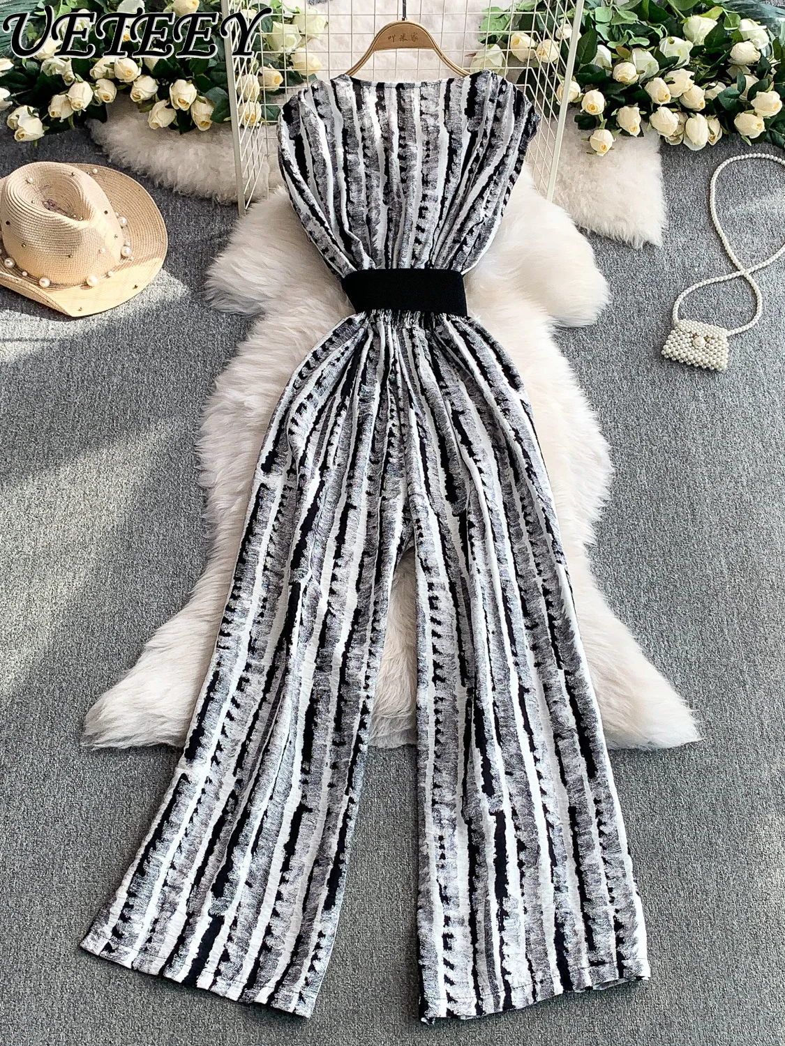 อารมณ์พิมพ์คอวีแขนสั้นJumpsuitผู้หญิงฤดูร้อนความรู้สึกอาวุโสกับเข็มขัดเอวสูงกางเกงขากว้างBodysuit