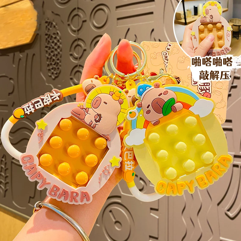 Cartoon Capybara Knock Wooden Fish Animal Pinch Happy Toy Keychain Cute Capibala Ducklings Sit On The Capybara Head Rest Keyring