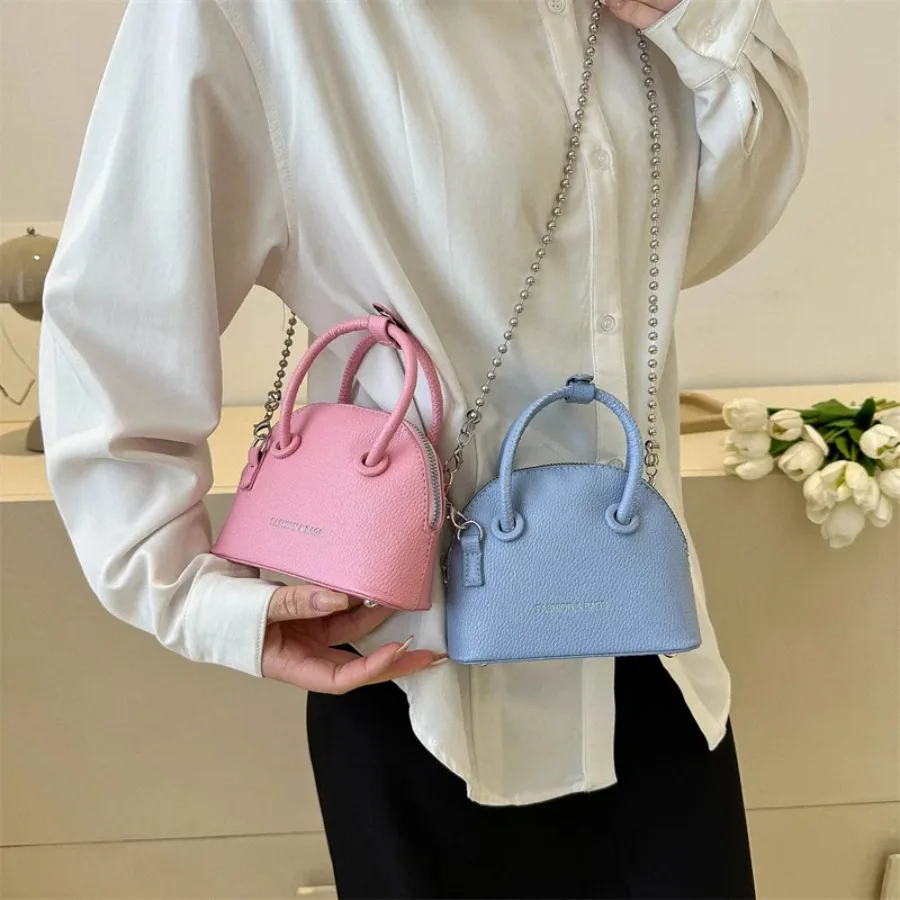 

Spring and summer new fashion popular Korean version of the handheld mini simple single shoulder crossbody shell female bag