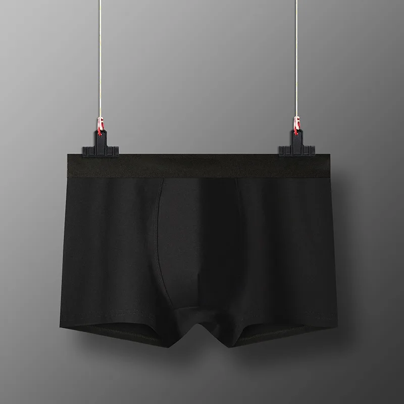 Twelve pairs of men's mid waist sexy flat leg pants made of pure cotton four cornered pants